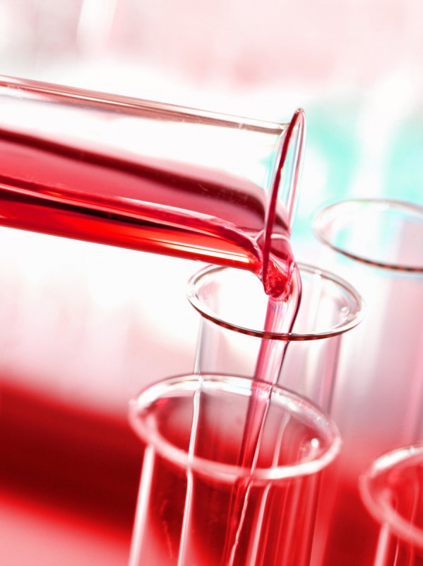 glass-test-tube-pouring-liquid-biology-research-laboratory-red-background91